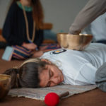 Beyond Yoga: Why “Gong Baths” and “Vedic Breathwork” Are the New Corporate Stress-Busters