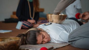 Beyond Yoga: Why “Gong Baths” and “Vedic Breathwork” Are the New Corporate Stress-Busters